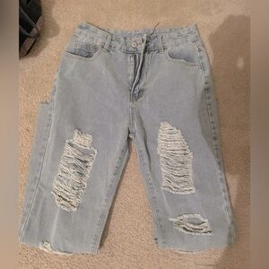 Distressed denim jeans